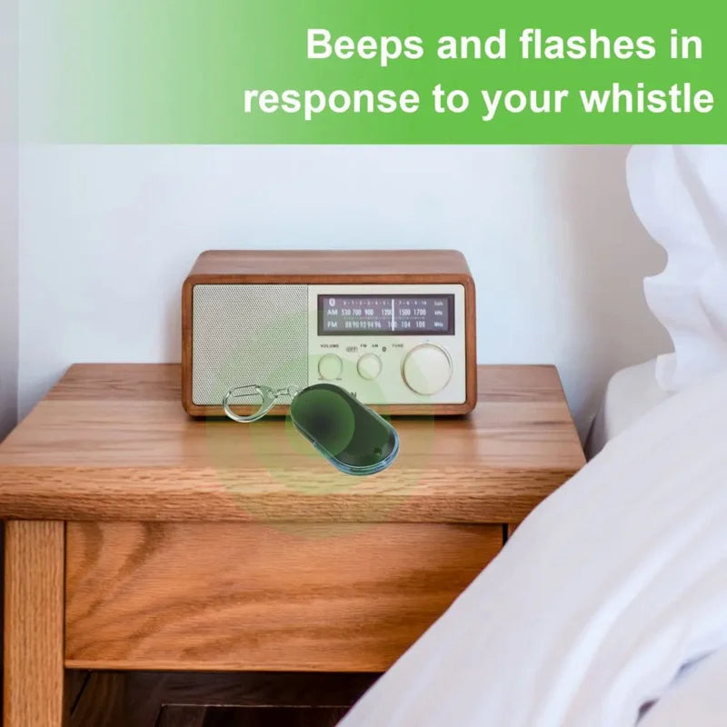 SmartFind anti-lost car key finder with whistle activation, loud beep, and built-in LED flashlight.