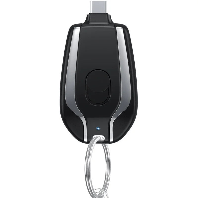PowerMini 2000mAh keychain power bank with wireless charging for Apple Watch and smartphones.